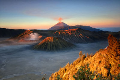 Panoramic view of volcanic mountain during sunset