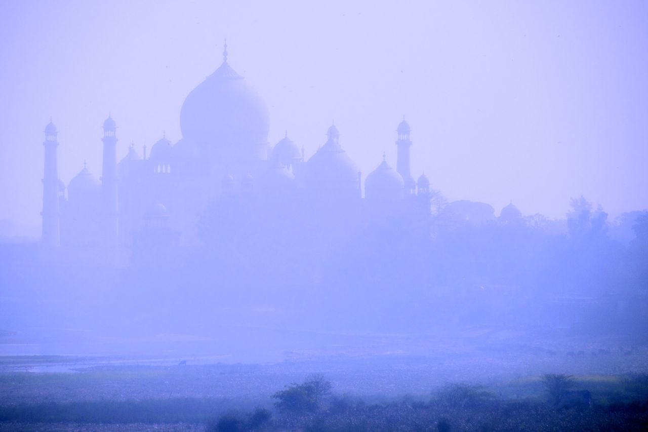 VIEW OF TEMPLE AGAINST CLOUDY SKY