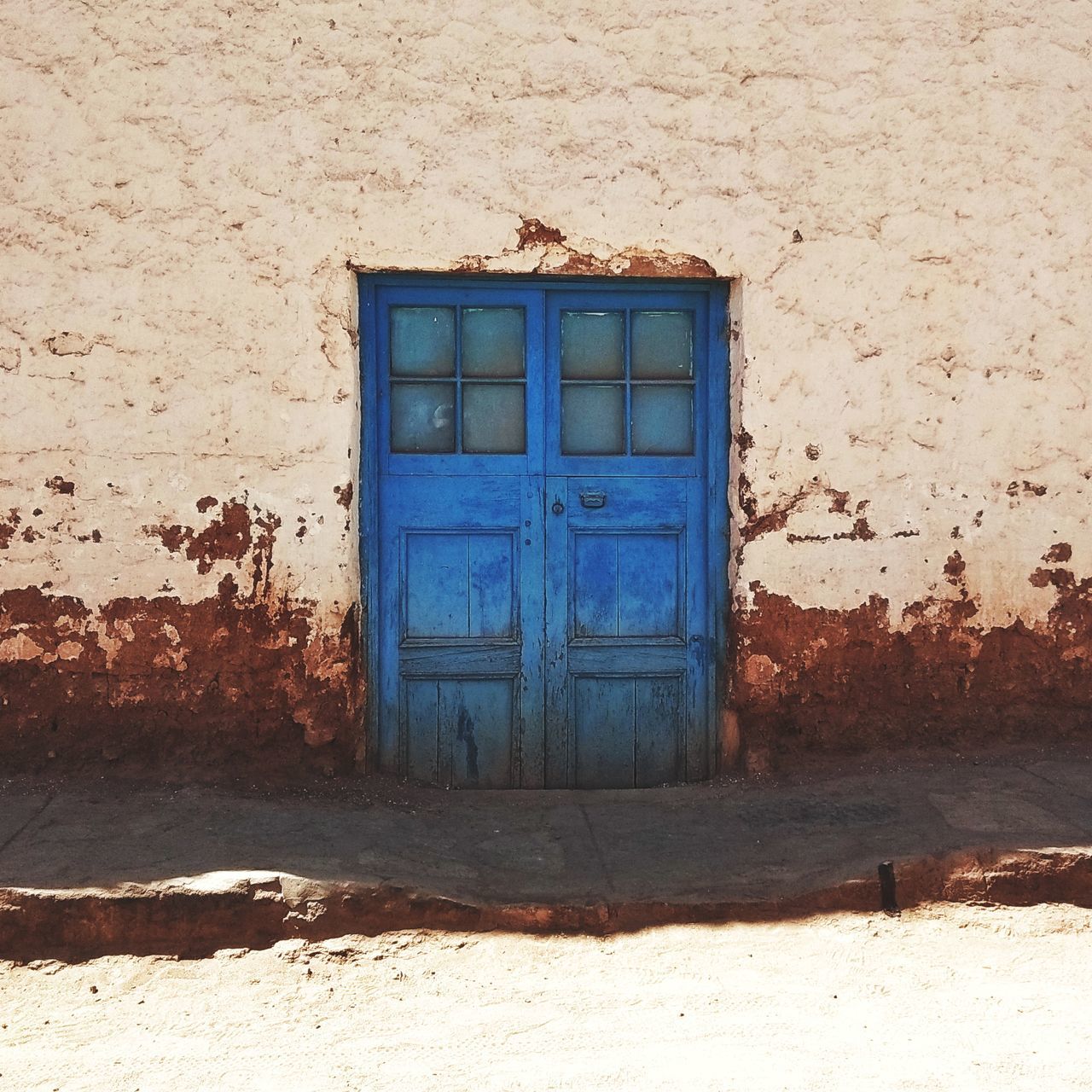 building exterior, closed, built structure, entrance, door, architecture, day, blue, no people, window, building, wall - building feature, house, outdoors, safety, security, nature, sunlight, residential district, protection