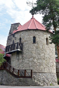 Low angle view of old building against sky