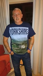 Portrait of man standing with text