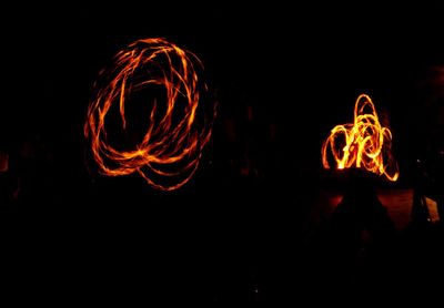 Light painting against sky at night