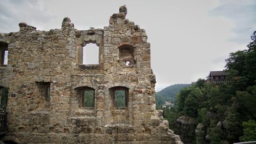 Low angle view of old building against sky