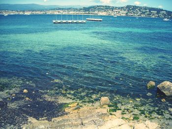 High angle view of sea against blue sky