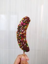 Person holding ice cream cone