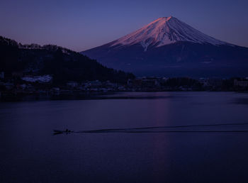 Beautiful sunrise and mount fuji with boat