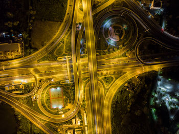 Light trails on road in city at night