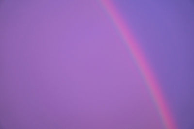 Low angle view of rainbow against sky