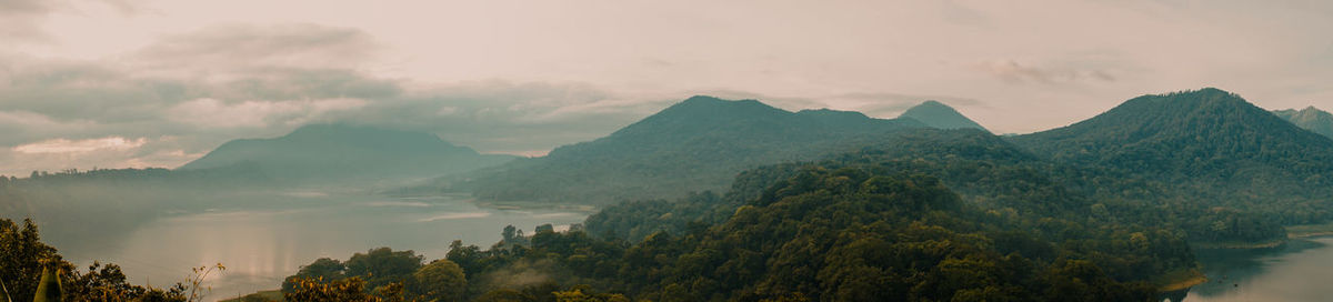 Panoramic view of mountains against sky during sunset