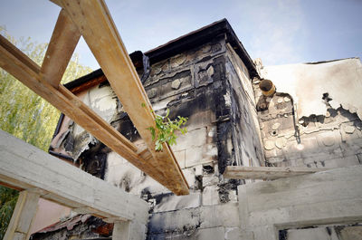 Low angle view of old building against sky