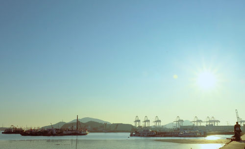 Scenic view of bay against clear sky