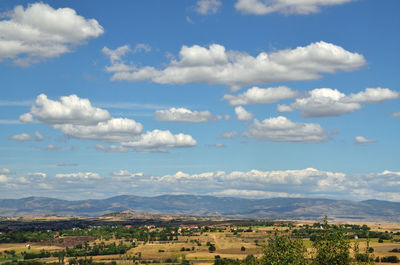 Aerial view of townscape against sky