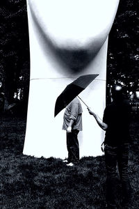 Woman standing in the dark