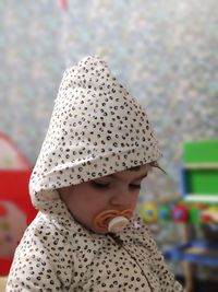 Portrait of cute boy looking away