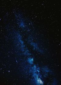 Low angle view of stars in sky at night