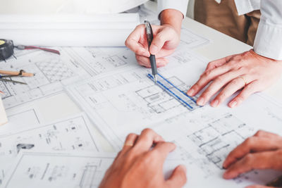 High angle view of man working on table