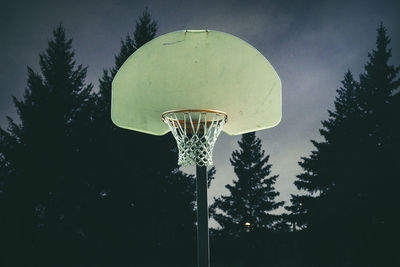 Low angle view of basketball hoop against sky