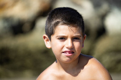 Close up of a little kid shirtless