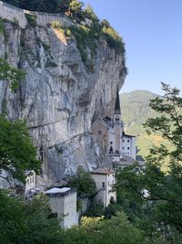 Low angle view of buildings against mountain