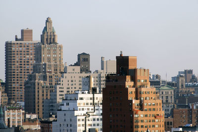 Cityscape against clear sky