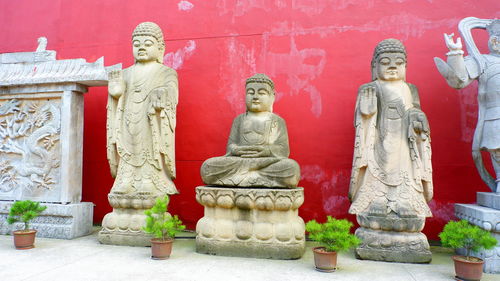 Statue against temple outside building