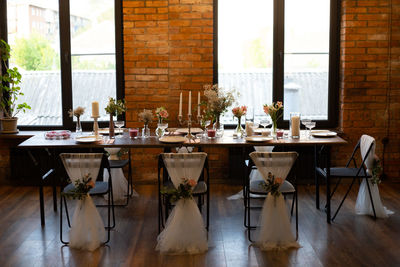 Chairs and tables in glass window