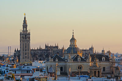 View of cathedral in city against clear sky