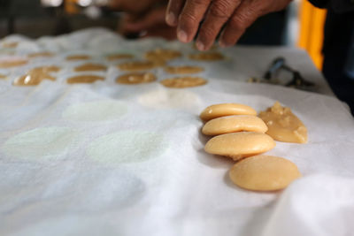 Close-up of person preparing food