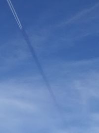 Low angle view of vapor trail in sky