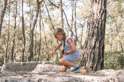  kid girl traveler of eight years old explore ancient excavations of ruins ancient lycian city