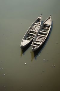 High angle view of boat moored in lake