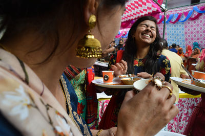 Friends having food at event