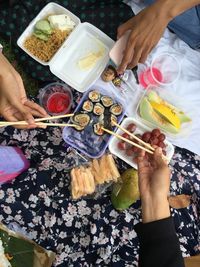 High angle view of people preparing food