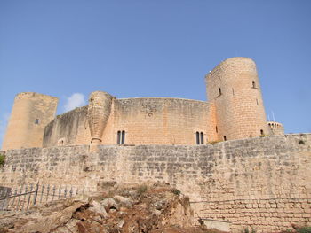 Low angle view of fort against clear sky