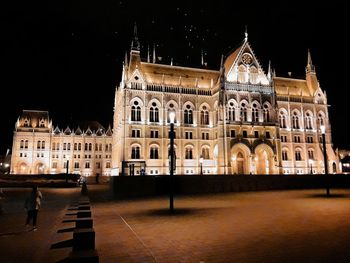 Low angle view of historical building at night