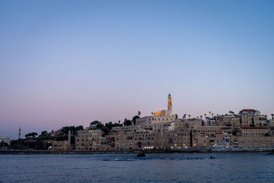 Old jaffa by sea against clear sky