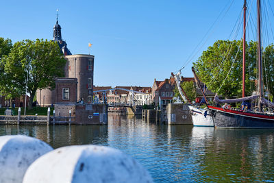 Picturesque view with water reflections and old historical buildings in enkhuizen