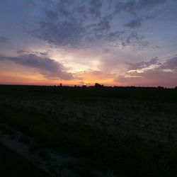 Scenic view of landscape at sunset