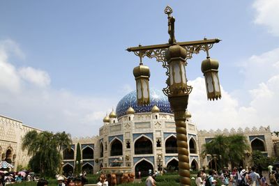 Group of people in front of historical building