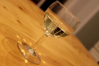 Close-up of wine glass on table
