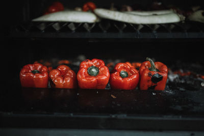 Close-up of red chili peppers in kitchen