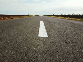 Surface level of road against sky