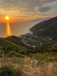 Scenic view of landscape against sky during sunset