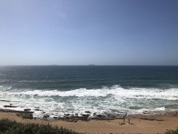 Scenic view of sea against clear sky