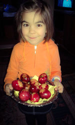 Midsection of girl holding food
