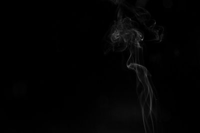 Close-up of smoke against black background