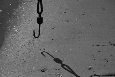 Close-up of shadow on sand