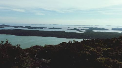 Scenic view of sea against cloudy sky