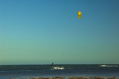 Scenic view of sea against clear sky