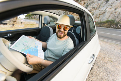 Low section of woman in car